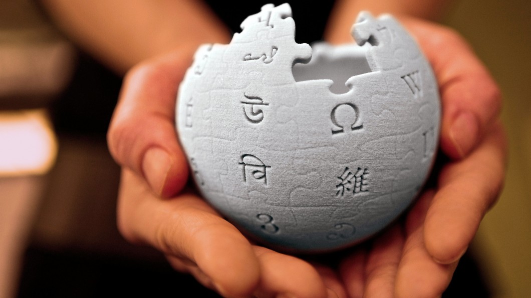 Wikipedia logo marca 1060×596 1
